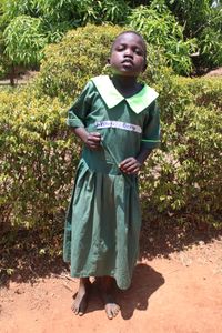 Kituyi Betty, 8 Jahre, Middle Class